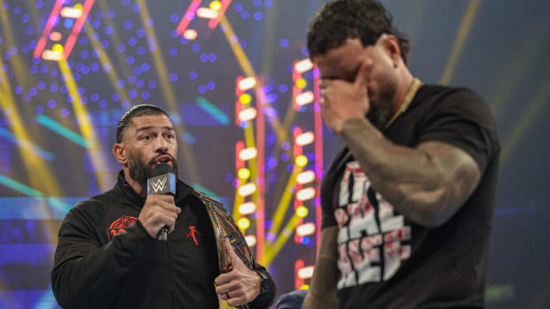 Roman Reigns and Jey Uso during a promo segment on SmackDown
